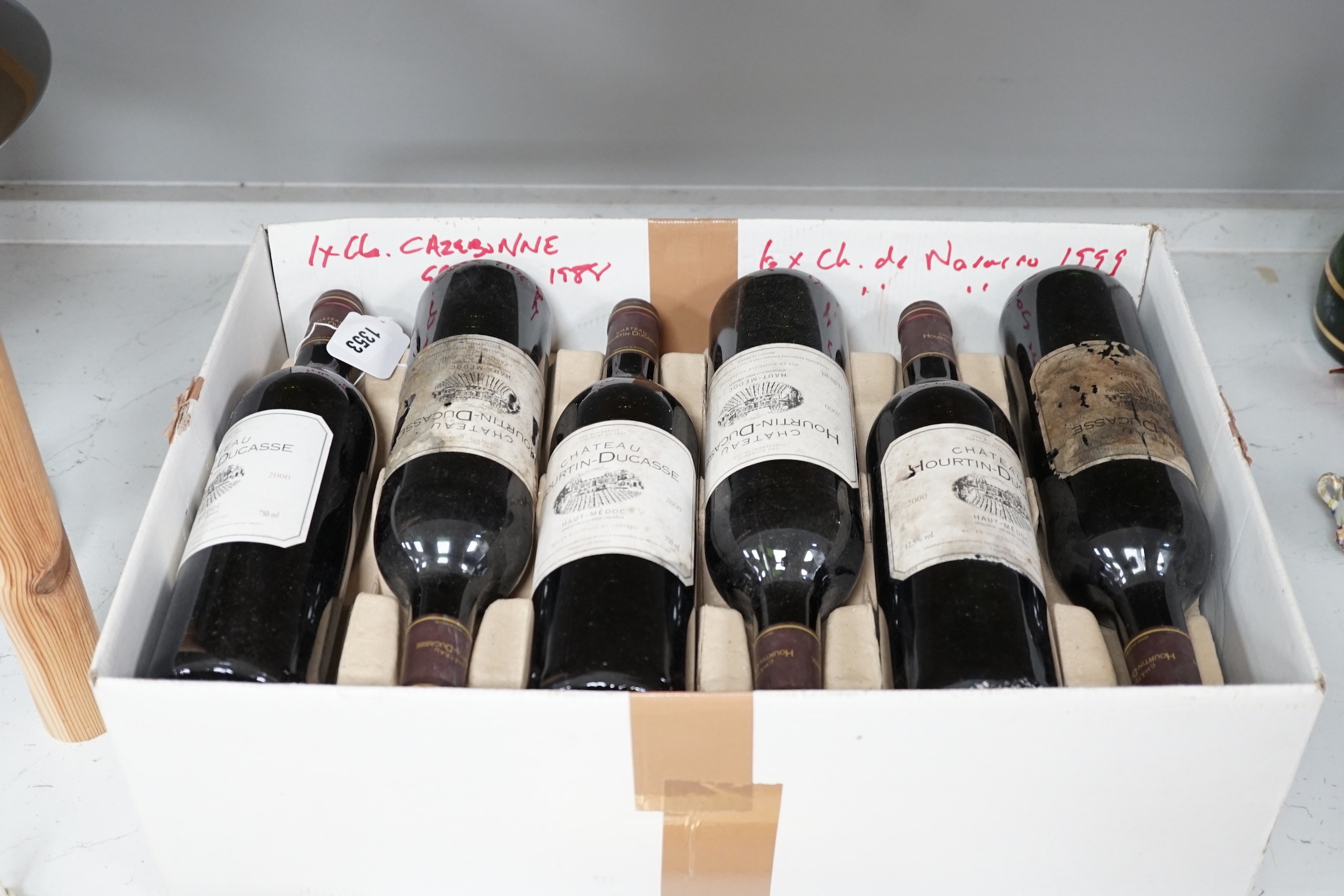 A case of twelve bottles of 2000 Chateau Hourtin Ducasse